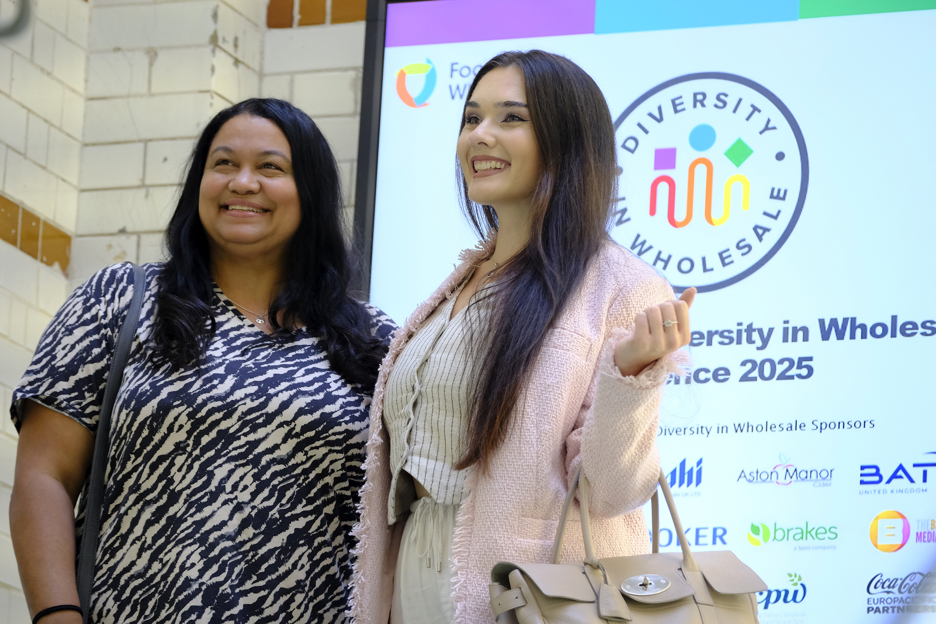 Diversity in Wholesale conference 2025  candid attendees in foyer